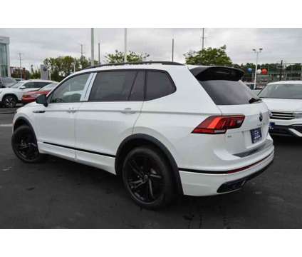 2024 Volkswagen Tiguan 2.0T SE R-Line Black is a White 2024 Volkswagen Tiguan 2.0T SUV in Highland Park IL