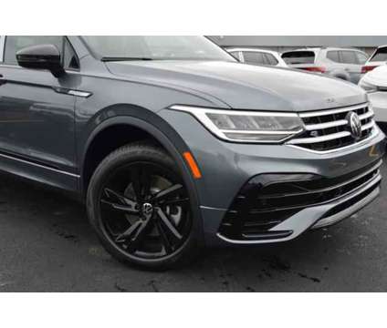 2024 Volkswagen Tiguan 2.0T SE R-Line Black is a Grey, Silver 2024 Volkswagen Tiguan 2.0T SUV in Highland Park IL