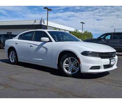 2022 Dodge Charger SXT is a White 2022 Dodge Charger SXT Car for Sale in Aurora CO