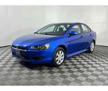 2015 Mitsubishi Lancer ES is a Blue 2015 Mitsubishi Lancer ES Sedan in Palatine IL