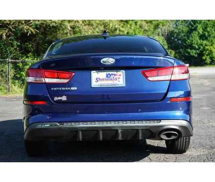 2020 Kia Optima LX is a Blue 2020 Kia Optima LX Sedan in Rome GA