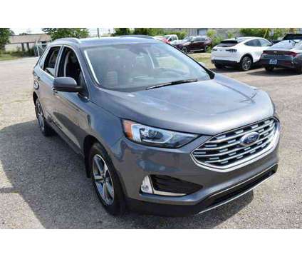 2021 Ford Edge SEL is a Grey 2021 Ford Edge SEL SUV in Lawrence KS