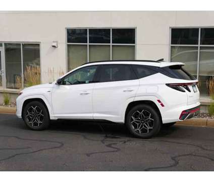 2024 Hyundai Tucson Hybrid N Line is a White 2024 Hyundai Tucson Hybrid in Saint Paul MN