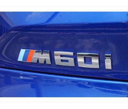 2025 BMW X5 M60i is a Blue 2025 BMW X5 3.0si SUV in Fort Walton Beach FL