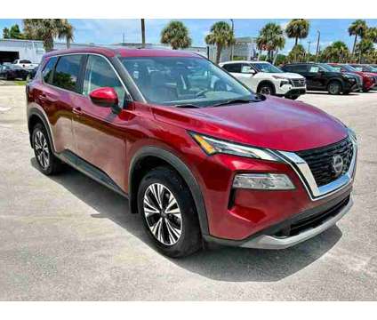 2023 Nissan Rogue SV is a Red 2023 Nissan Rogue SV Station Wagon in Fort Pierce FL