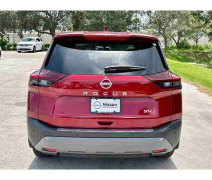 2023 Nissan Rogue SV is a Red 2023 Nissan Rogue SV Station Wagon in Fort Pierce FL