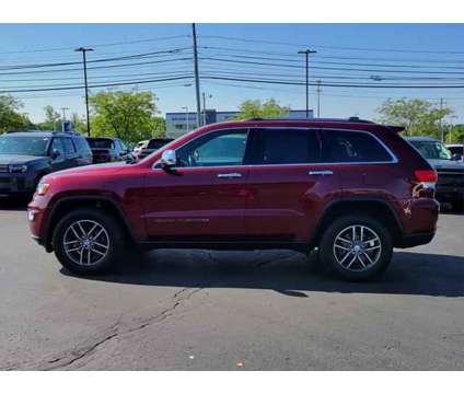 2018 Jeep Grand Cherokee Limited 4x4 is a Red 2018 Jeep grand cherokee Limited SUV in Brunswick OH