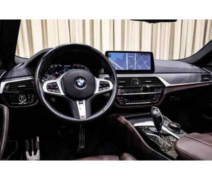 2023 BMW 5 Series M550i xDrive is a White 2023 BMW 5-Series Sedan in Akron OH