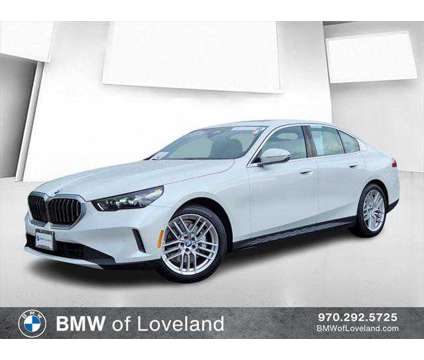 2024 BMW 5 Series i xDrive is a White 2024 BMW 5-Series Sedan in Loveland CO