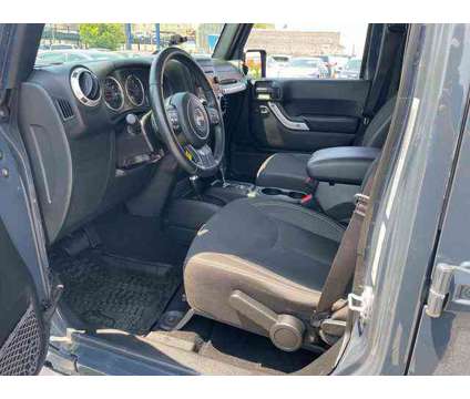 2017 Jeep Wrangler Unlimited Sahara 4x4 is a 2017 Jeep Wrangler Unlimited Sahara SUV in Fall River MA