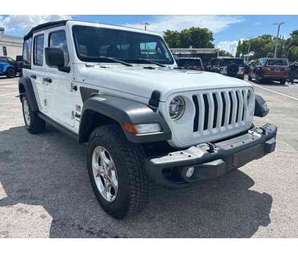 2021 Jeep Wrangler Unlimited Freedom is a White 2021 Jeep Wrangler Unlimited SUV in Fort Lauderdale FL