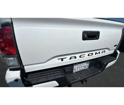 2021 Toyota Tacoma TRD Sport is a White 2021 Toyota Tacoma TRD Sport Truck in Ventura CA