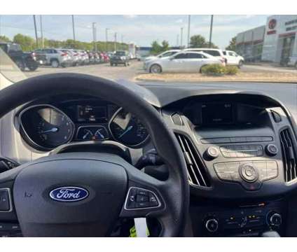 2018 Ford Focus SE is a White 2018 Ford Focus SE Sedan in Dubuque IA