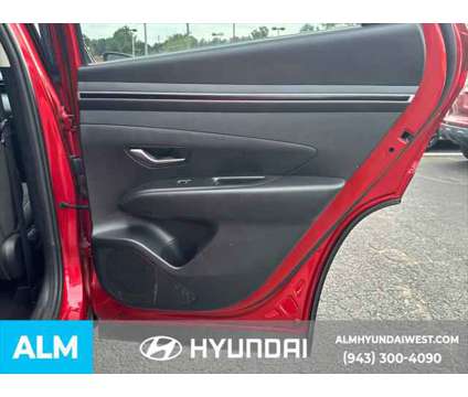 2022 Hyundai Tucson SEL is a Red 2022 Hyundai Tucson SUV in Lithia Springs GA