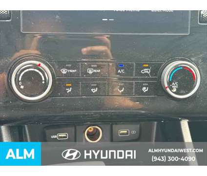 2022 Hyundai Tucson SEL is a Red 2022 Hyundai Tucson SUV in Lithia Springs GA