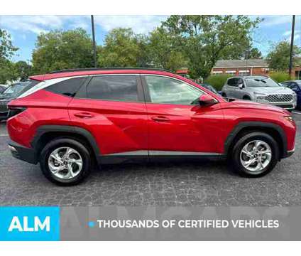 2022 Hyundai Tucson SEL is a Red 2022 Hyundai Tucson SUV in Lithia Springs GA