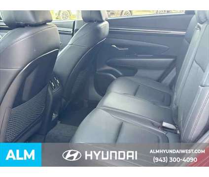 2023 Hyundai Tucson SEL is a Red 2023 Hyundai Tucson SUV in Lithia Springs GA