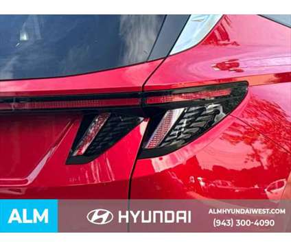 2023 Hyundai Tucson SEL is a Red 2023 Hyundai Tucson SUV in Lithia Springs GA