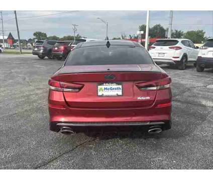 2020 Kia Optima SX Turbo is a Red 2020 Kia Optima SX Sedan in Dubuque IA