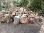 Cut and split seasoned oak firewood and stove