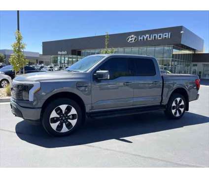 2023 Ford F-150 Lightning Platinum is a Grey 2023 Ford F-150 Truck in Lindon UT