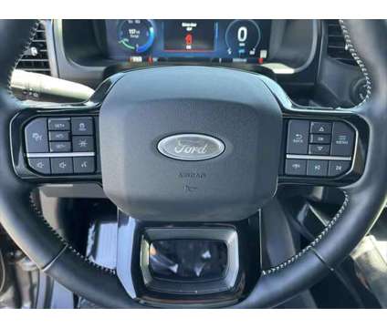 2023 Ford F-150 Lightning Platinum is a Grey 2023 Ford F-150 Truck in Lindon UT