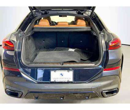 2022 BMW X6 xDrive40i is a Black 2022 BMW X6 SUV in Huntington Station NY