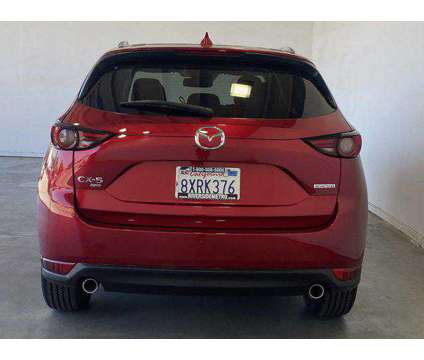 2021 Mazda CX-5 Grand Touring is a Red 2021 Mazda CX-5 Grand Touring SUV in Riverside CA