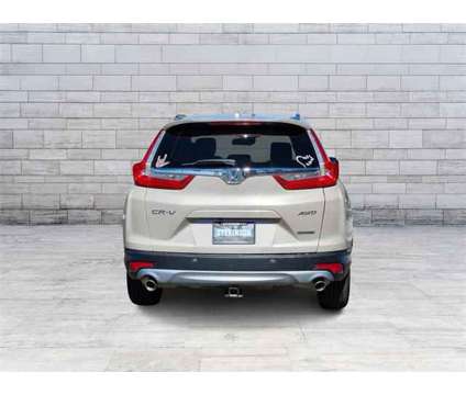 2017 Honda CR-V Touring is a Tan 2017 Honda CR-V Touring SUV in Longmont CO