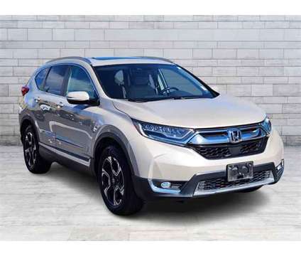 2017 Honda CR-V Touring is a Tan 2017 Honda CR-V Touring SUV in Longmont CO