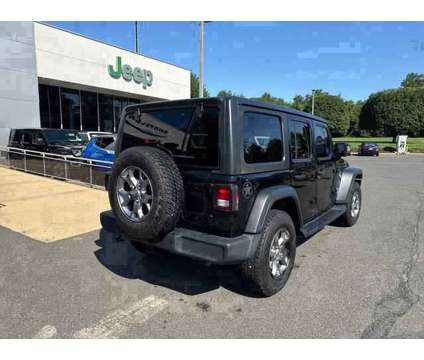 2020 Jeep Wrangler Unlimited Freedom 4X4 is a Black 2020 Jeep Wrangler Unlimited SUV in Freehold NJ