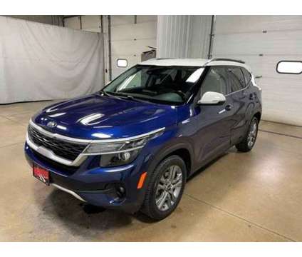 2021 Kia Seltos S is a Blue, White 2021 SUV in East Dubuque IL