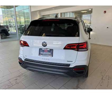 2024 Volkswagen Taos 1.5T SE is a White 2024 SUV in Logan UT