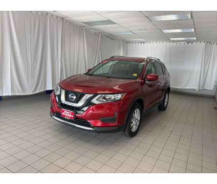 2018 Nissan Rogue SV is a Red 2018 Nissan Rogue SV SUV in Dubuque IA