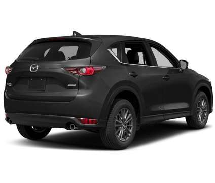 2017 Mazda CX-5 Touring is a Black 2017 Mazda CX-5 Touring SUV in Lawrence KS