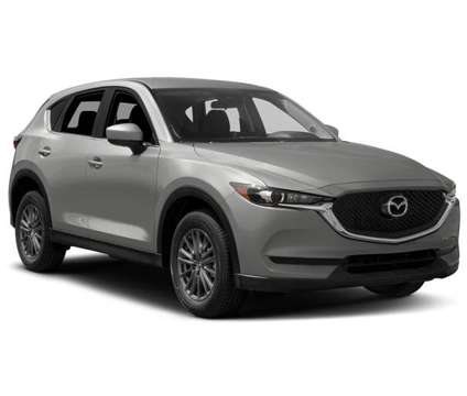 2017 Mazda CX-5 Touring is a Black 2017 Mazda CX-5 Touring SUV in Lawrence KS