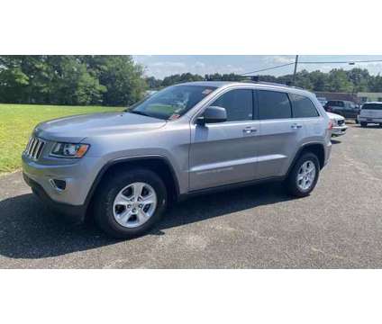 2014 Jeep Grand Cherokee for sale is a Silver 2014 Jeep grand cherokee Car for Sale in Forest City NC