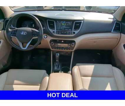 2017 Hyundai Tucson Limited is a Tan 2017 Hyundai Tucson Limited SUV in Merrillville IN