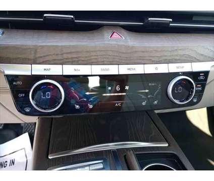 2021 Genesis G80 2.5T RWD is a Blue 2021 Genesis G80 3.8 Trim Sedan in Evansville IN