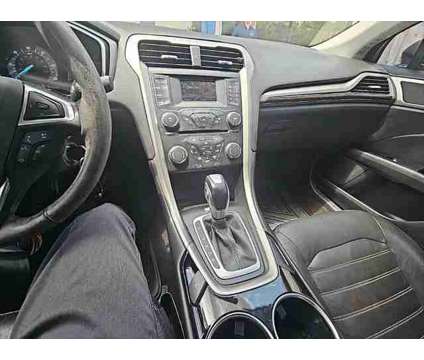 2013 Ford Fusion Hybrid SE is a Black 2013 Ford Fusion Hybrid SE Hybrid in Mobile AL