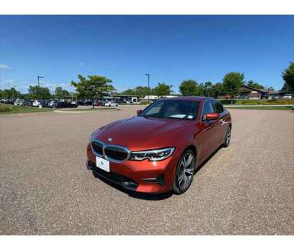 2021 BMW 3 Series xDrive is a Orange 2021 BMW 3-Series Sedan in Shelburne VT