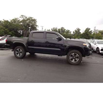 2018 Toyota Tacoma TRD Sport is a Black 2018 Toyota Tacoma TRD Sport Car for Sale in Laconia NH