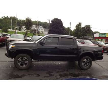 2018 Toyota Tacoma TRD Sport is a Black 2018 Toyota Tacoma TRD Sport Car for Sale in Laconia NH