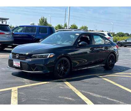 2022 Honda Civic Sport is a Black 2022 Honda Civic Sport Car for Sale in Elgin IL