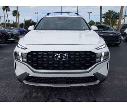 2023 Hyundai Santa Fe SEL is a White 2023 Hyundai Santa Fe SE SUV in Daytona Beach FL