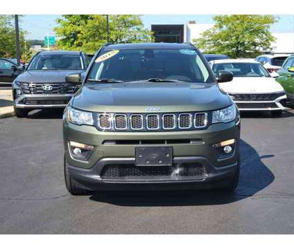 2018 Jeep Compass Latitude FWD is a Green 2018 Jeep Compass Latitude SUV in Brunswick OH