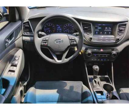 2018 Hyundai Tucson SEL is a Blue 2018 Hyundai Tucson SUV in Ocala FL