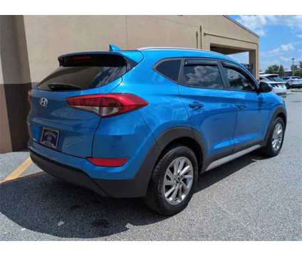 2018 Hyundai Tucson SEL is a Blue 2018 Hyundai Tucson SUV in Ocala FL