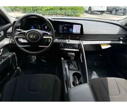 2024 Hyundai Elantra SEL is a White 2024 Hyundai Elantra Sedan in Sanford FL