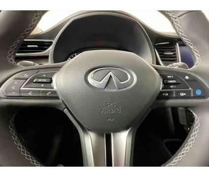 2024 Infiniti QX50 PURE is a Black 2024 Infiniti QX50 Pure Station Wagon in Miami FL